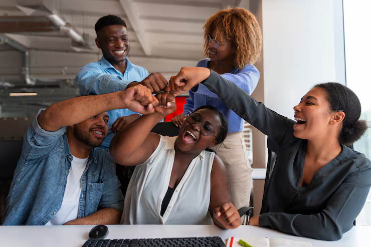 Happy team working together in the office